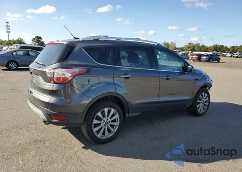 2017 Ford Escape Titanium z USA, uszkodzony, nr VIN 1FMCU9J90HUA44602